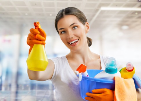 Curtain cleaning in a bright living room with dust-free drapes