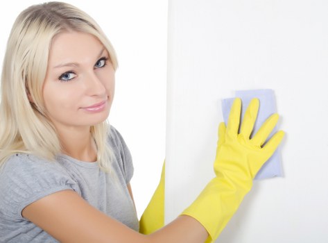 Vacuuming curtains as part of routine curtain cleaning